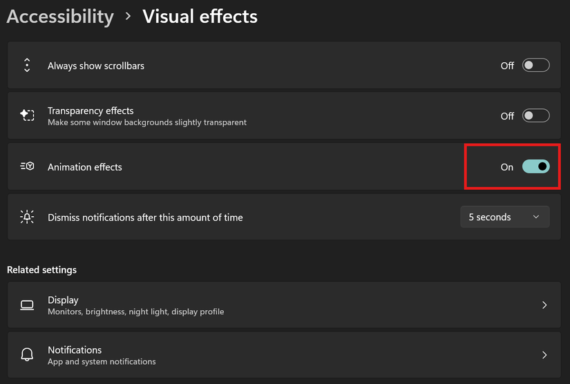 Windows 11 Accessibility visual effects settings page with the “Animation Effects” toggle highlighted in red and enabled.