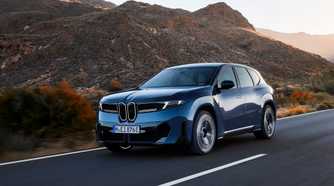 Front 3/4 shot of a 2027 BMW iX3