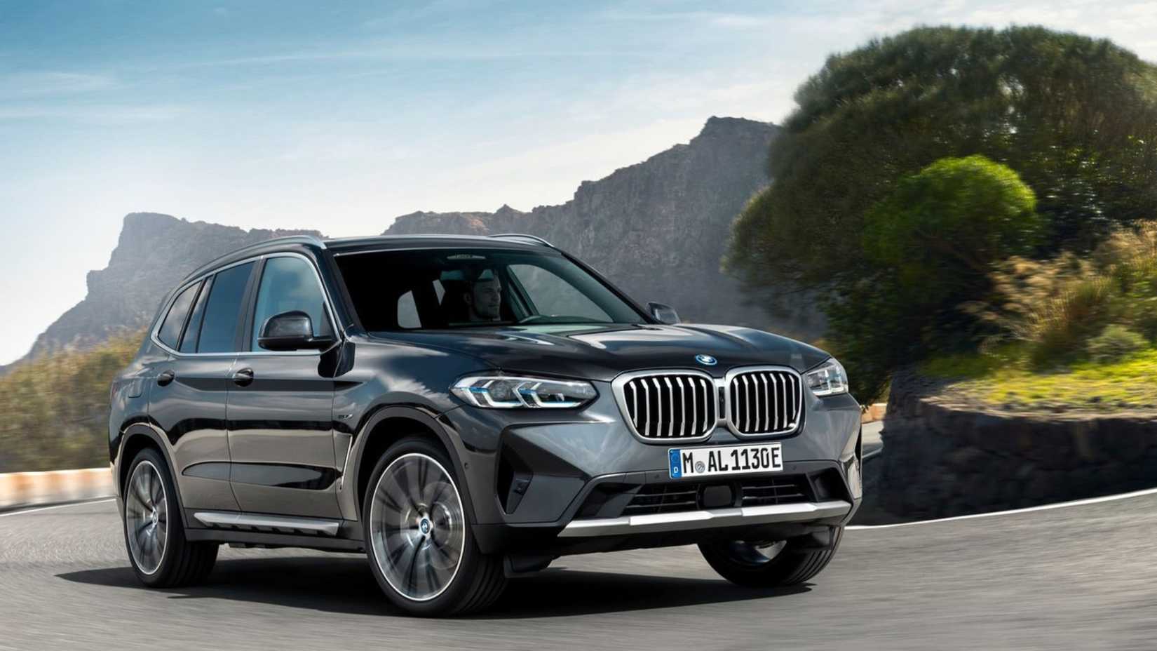 Dynamic front 3/4 shot of a 2022 BMW X3.