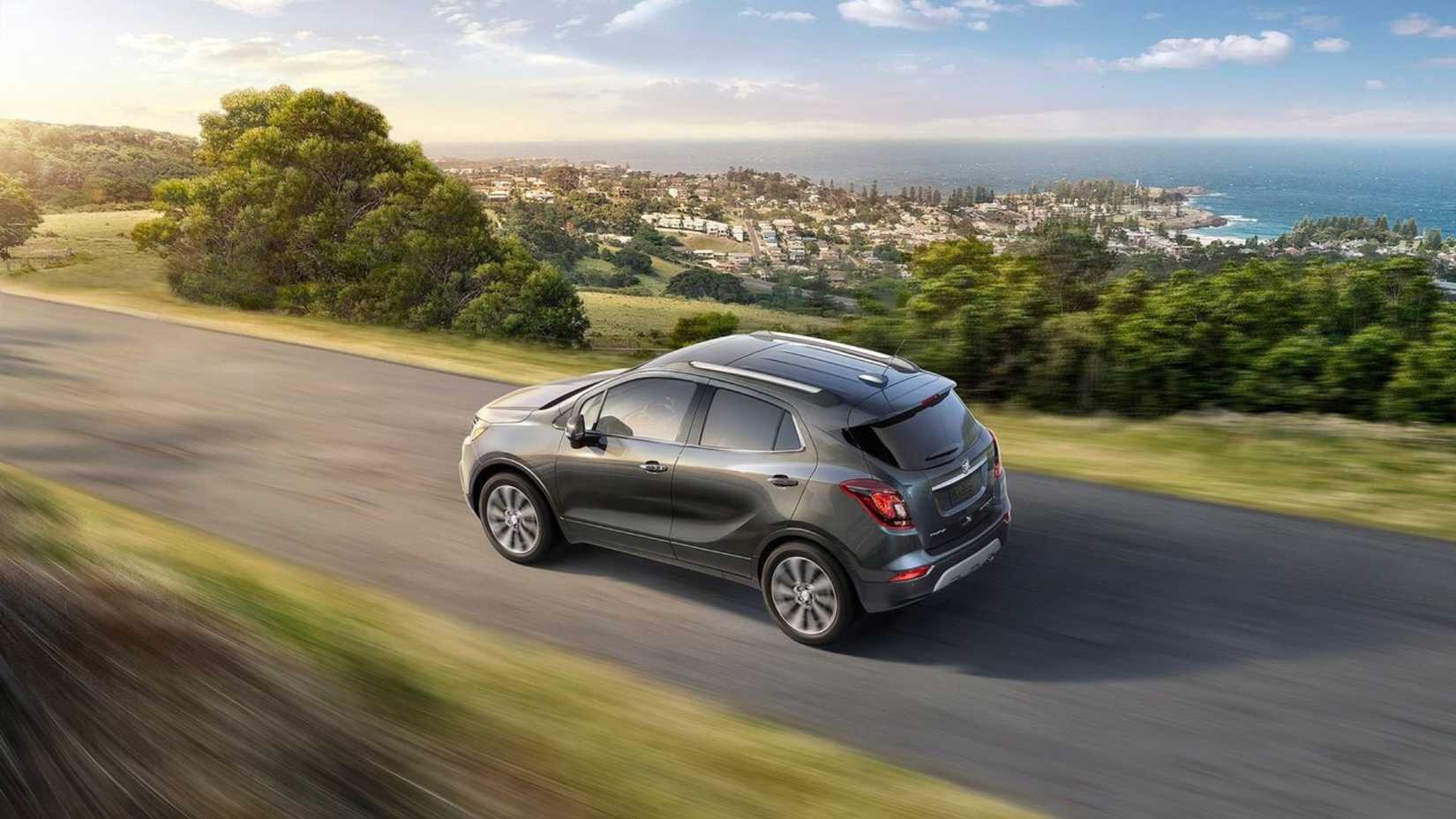 Dynamic side profile shot of a gray 2017 Buick Encore.