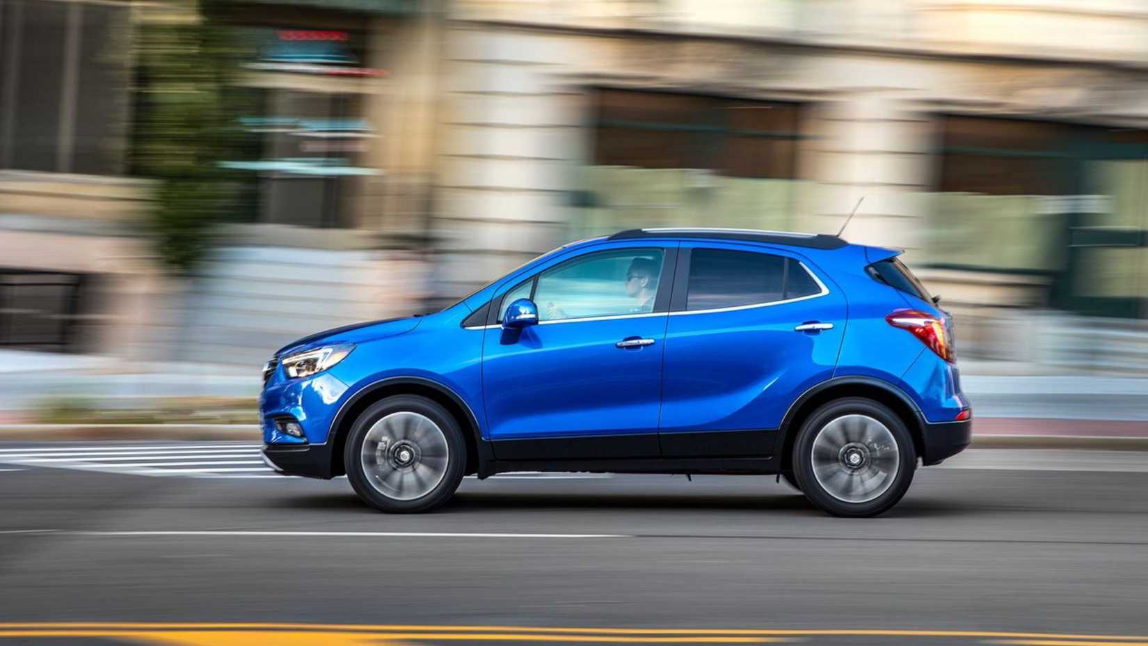 Dynamic side profile shot of a blue 2017 Buick Encore.