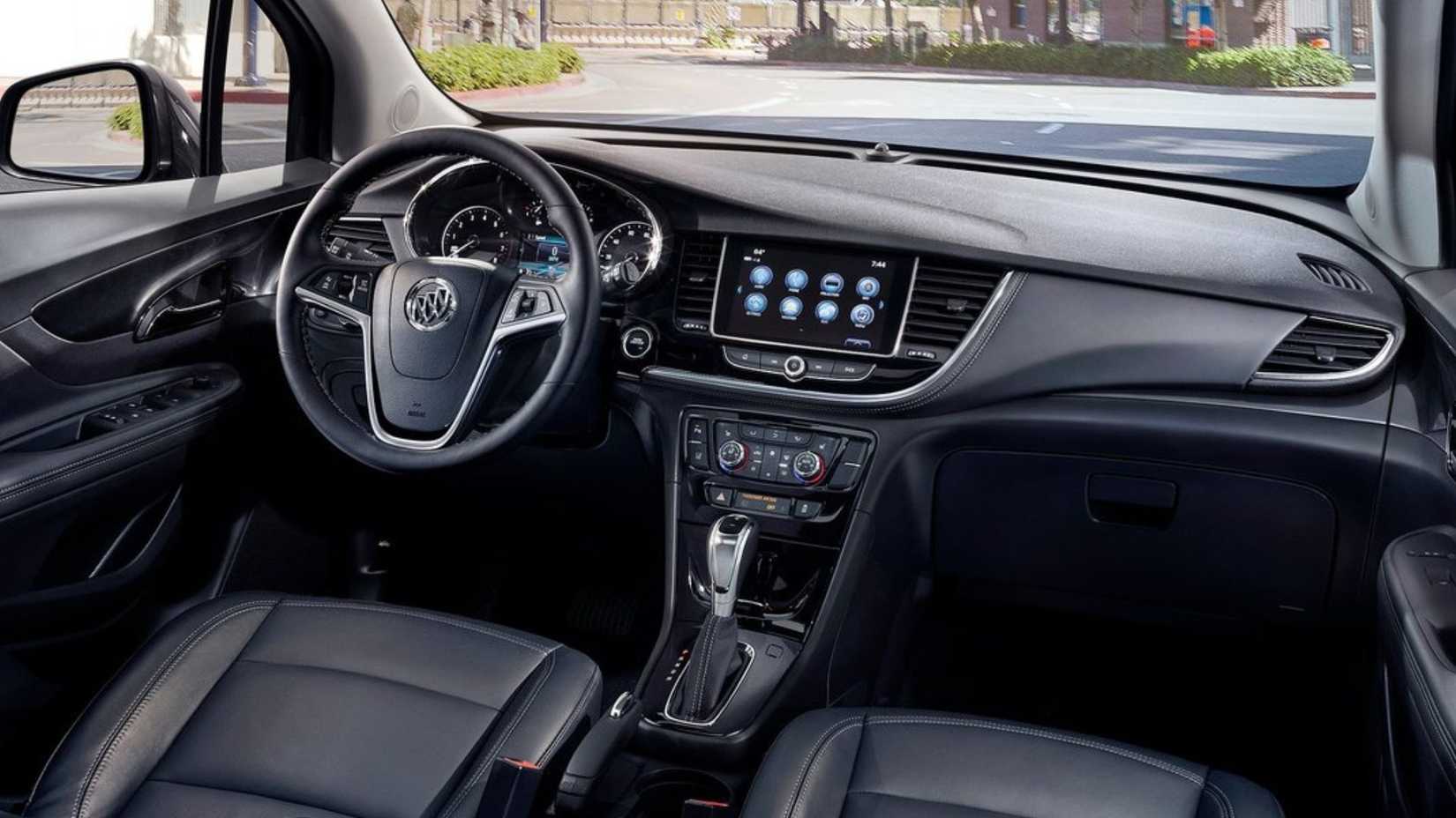 Shot of the dashboard inside the cabin of a 2017 Buick Encore.