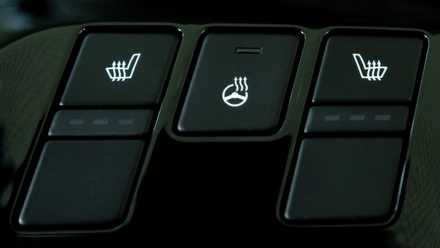 Close up of heated seats and steering wheel button