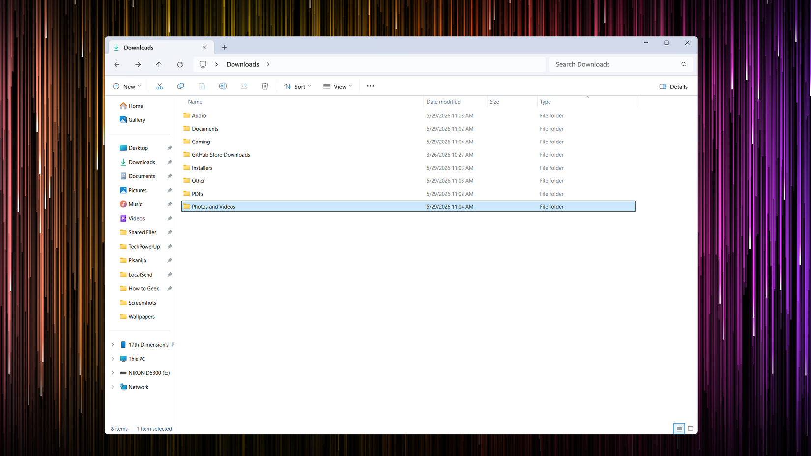 Reorganizing the Windows downloads folder by creating subfolders for different file types. 