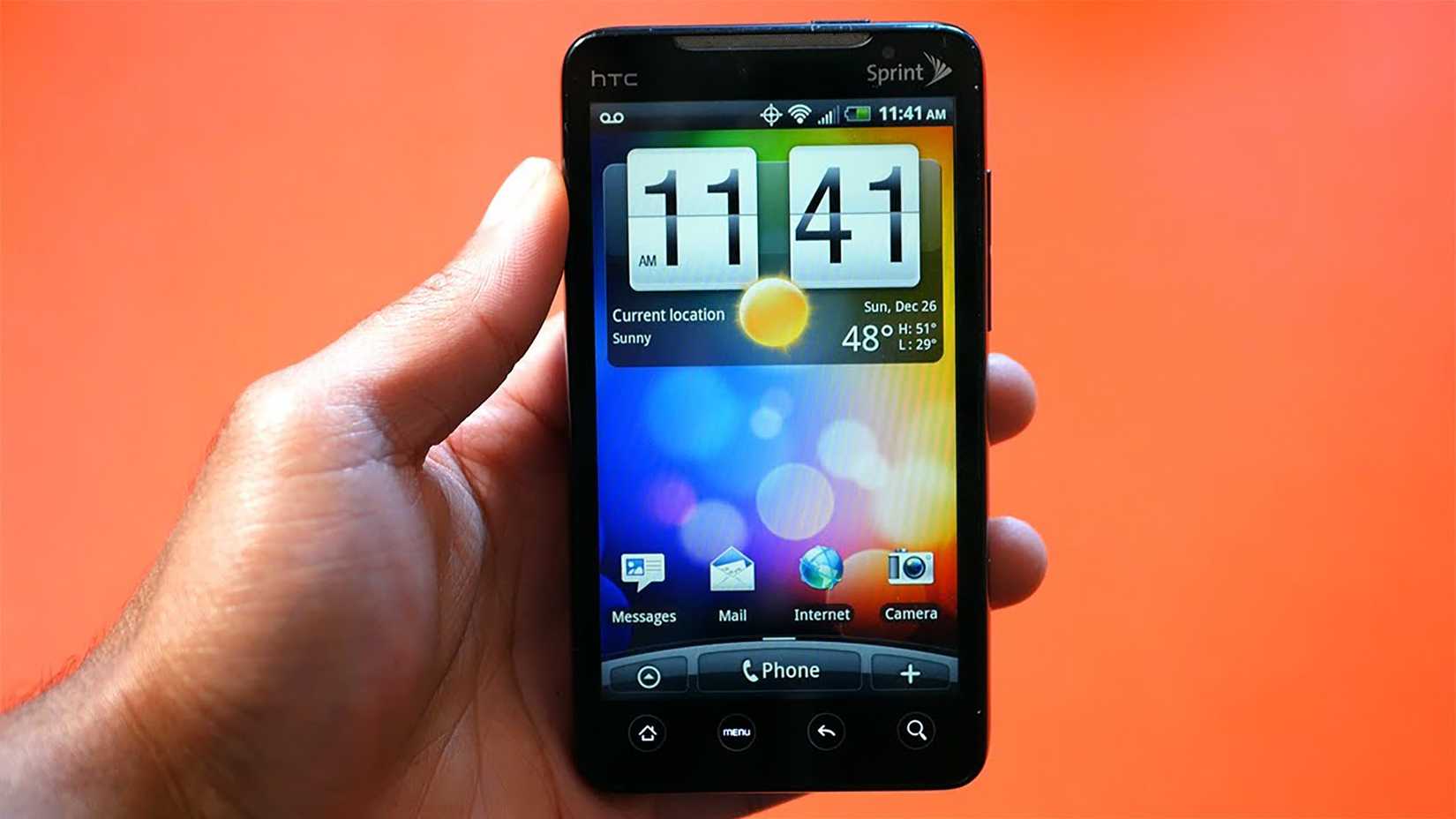 A HTC Evo 4G WiMAX Edition held in a hand. 
