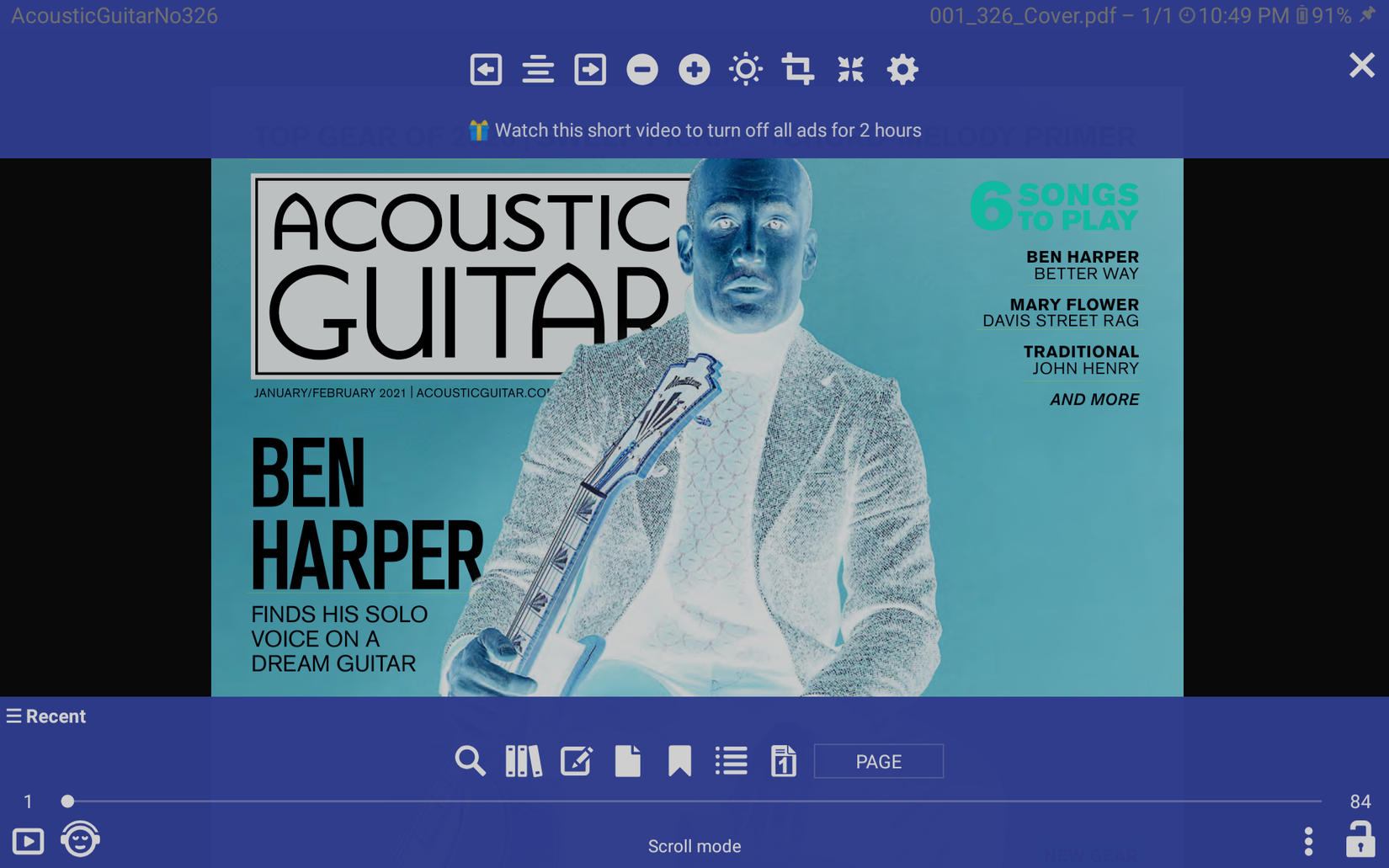A negative photo of the cover of acoustic guitar magazine in Librero.