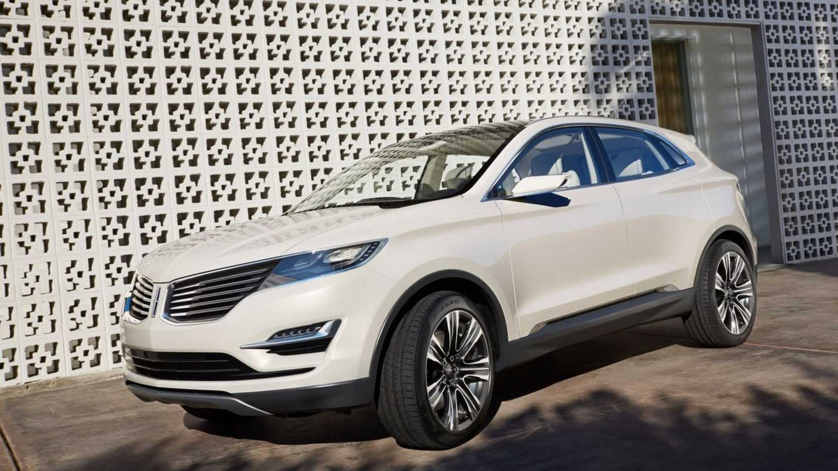 Static side profile shot of a white 2013 Lincoln MKC Concept.