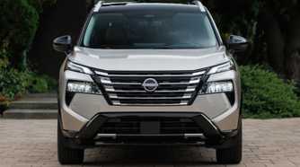 Static front-end shot of a gold 2024 Nissan Rogue.