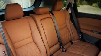 Shot of the rear seats inside the cabin of a 2024 Nissan Rogue.