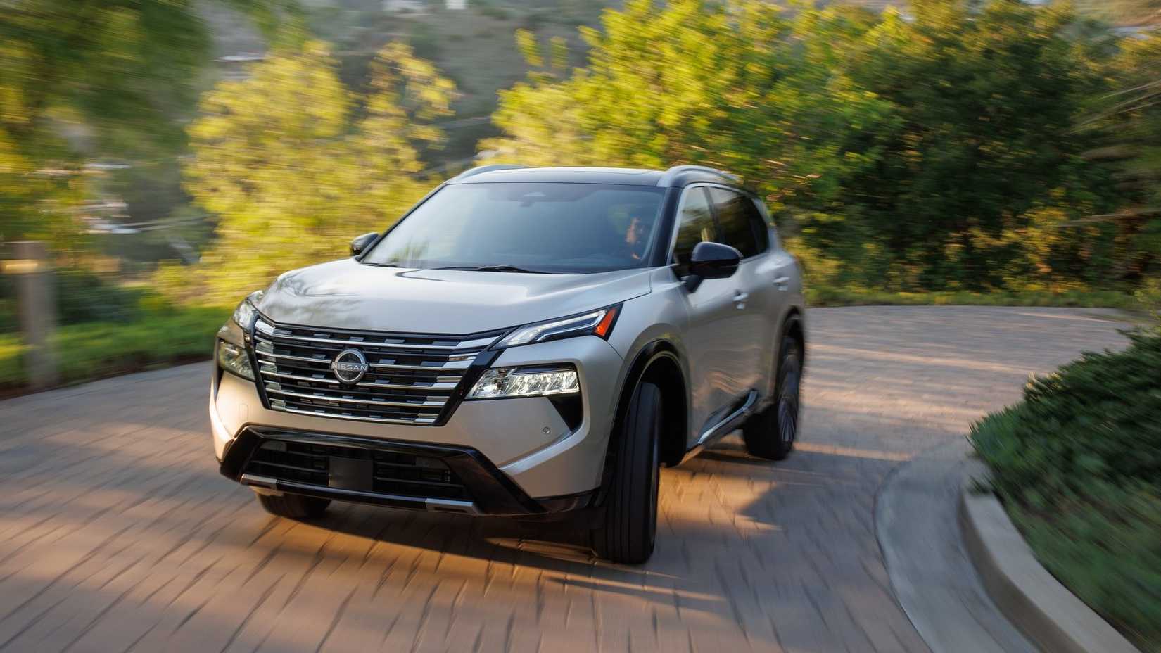 Front 3/4 action shot of a 2024 Nissan Rogue 