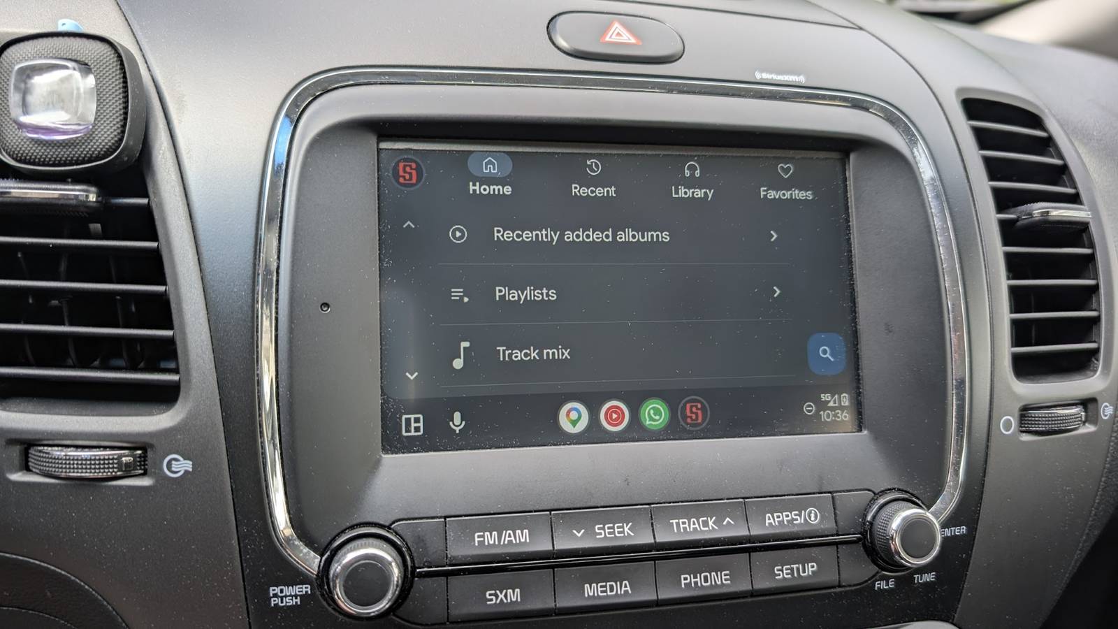 I finally found a local music player that works with Android Auto voice commands, and it's freed me from Spotify