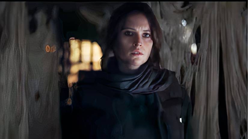 Jyn Erso in Rogue One: A Star Wars Story speaking to someone. 