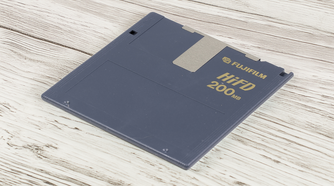 A Sony HiFD diskette lying on a wooden table.