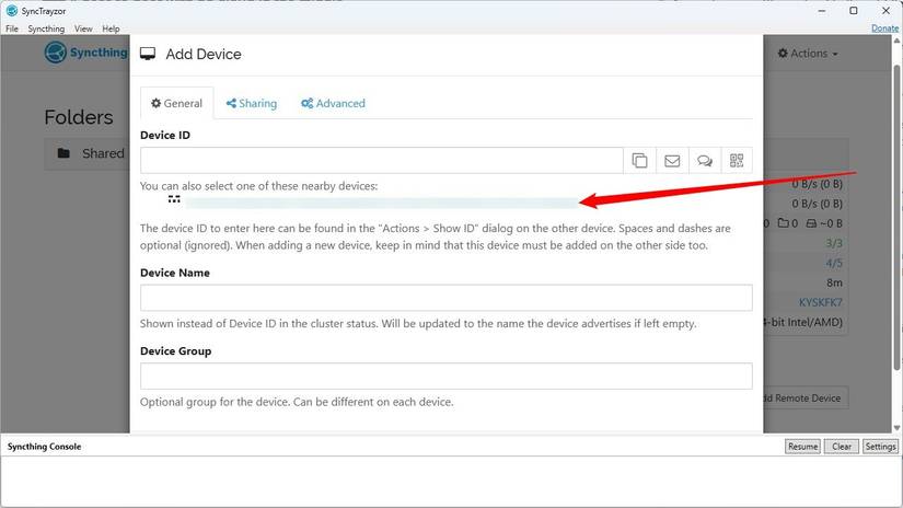 The Add Device screen in Syncthing with a blurred device ID. 