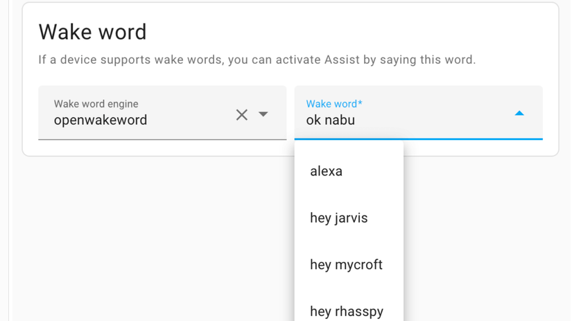 The Home Assistant Wake word settings showing the openwakeword engine and a dropdown of wake word options including alexa hey jarvis hey mycroft and hey rhasspy.