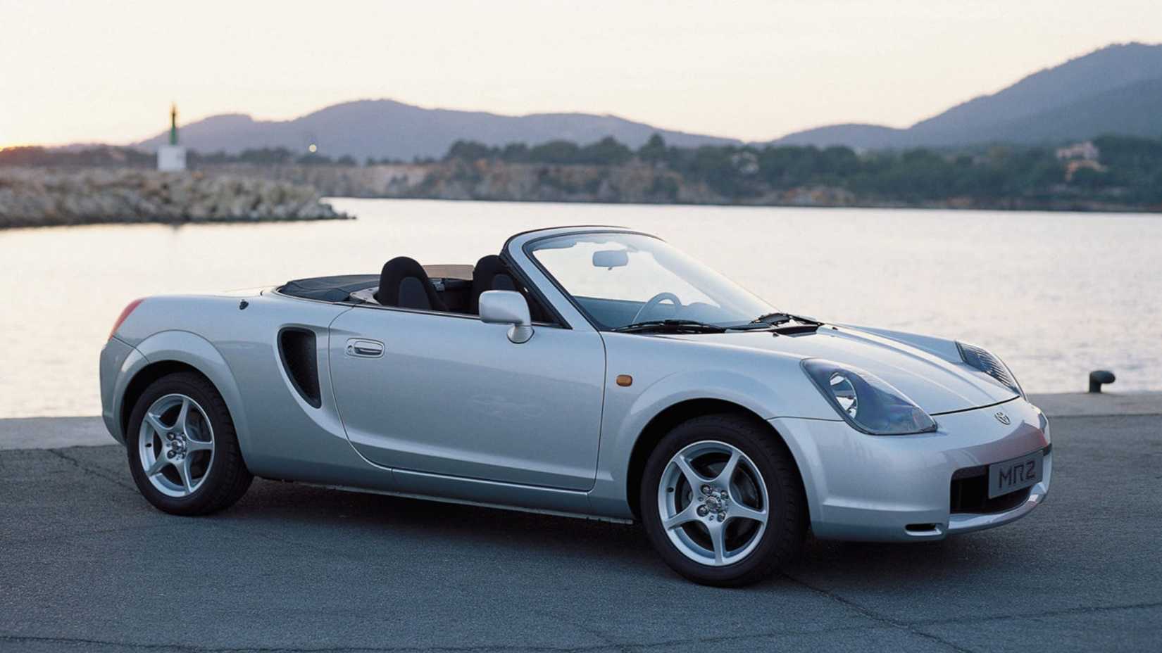 Static side profile shot of a silver 2000 Toyota MR2.