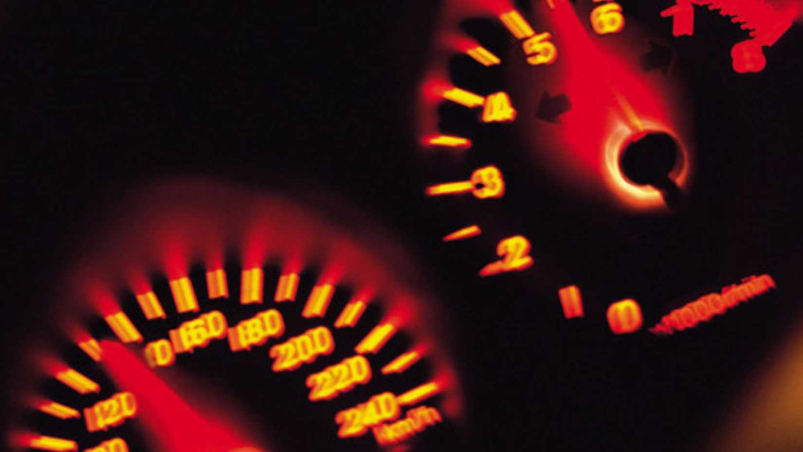 Close-up shot of the instrument cluster ont he dashboard of a 2000 Toyota MR2.
