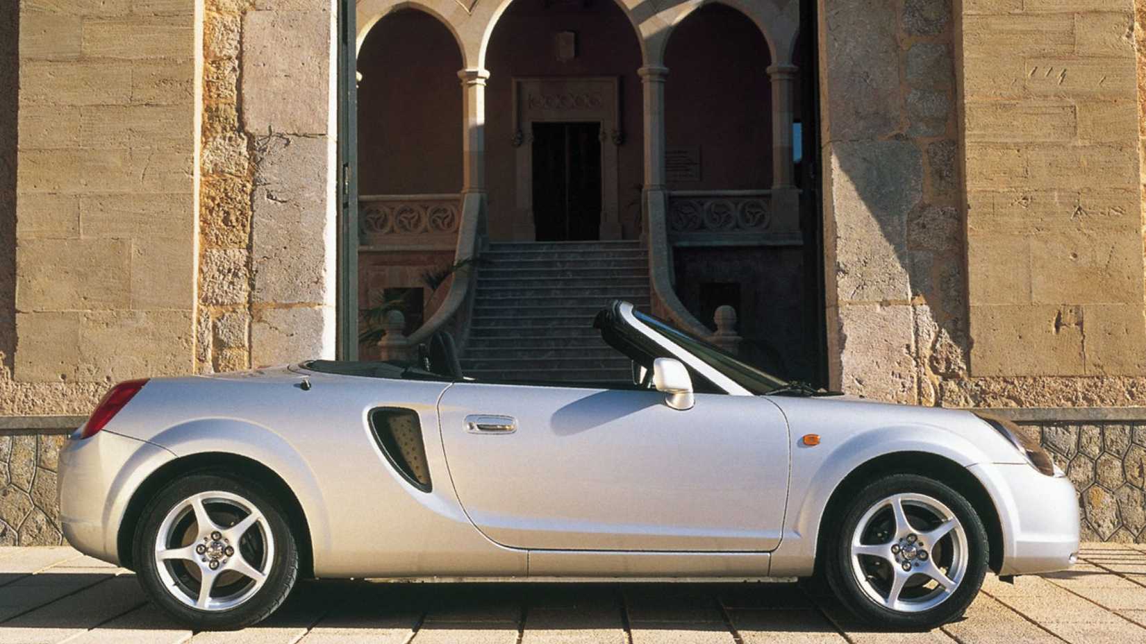 Static side profile shot of a silver 2000 Toyota MR2.