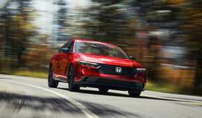 Front 3/4 action shot of a 2023 Honda Accord