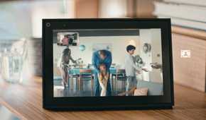 A black Facebook Portal on a video call.