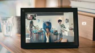 A black Facebook Portal on a video call.
