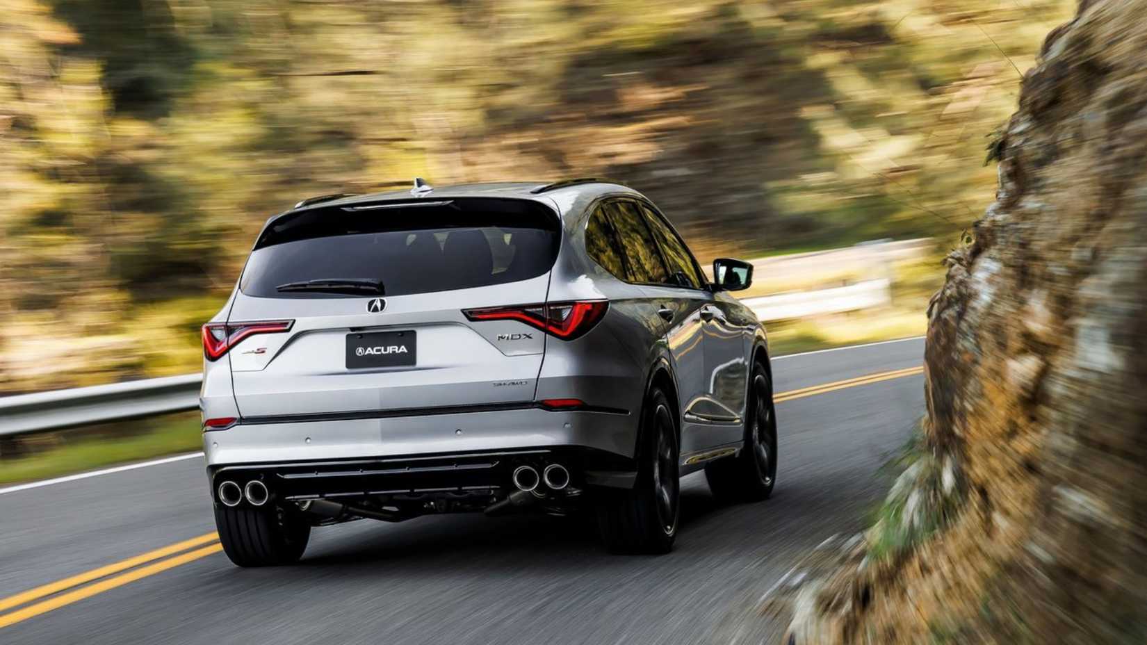 Dynamic rear view of the silver 2022 Acura MDX Type S.