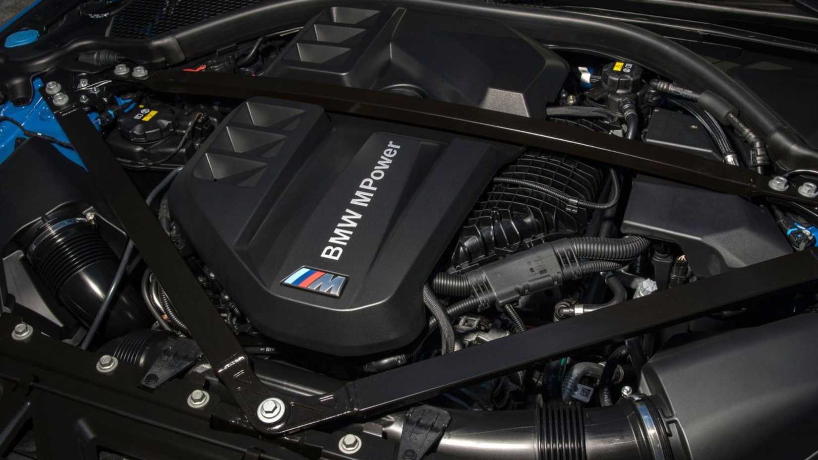 Shot of the engine under the hood of a 2022 BMW M4 Competition Coupe xDrive.