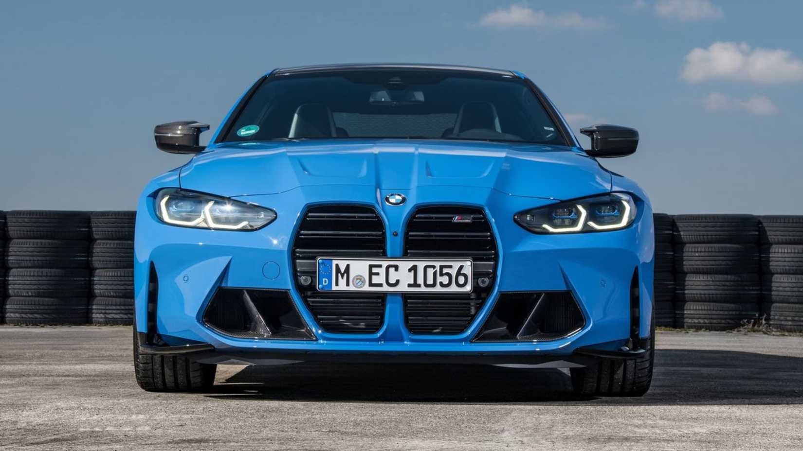 Statci front-end shot of a blue 2022 BMW M4 Competition Coupe xDrive.