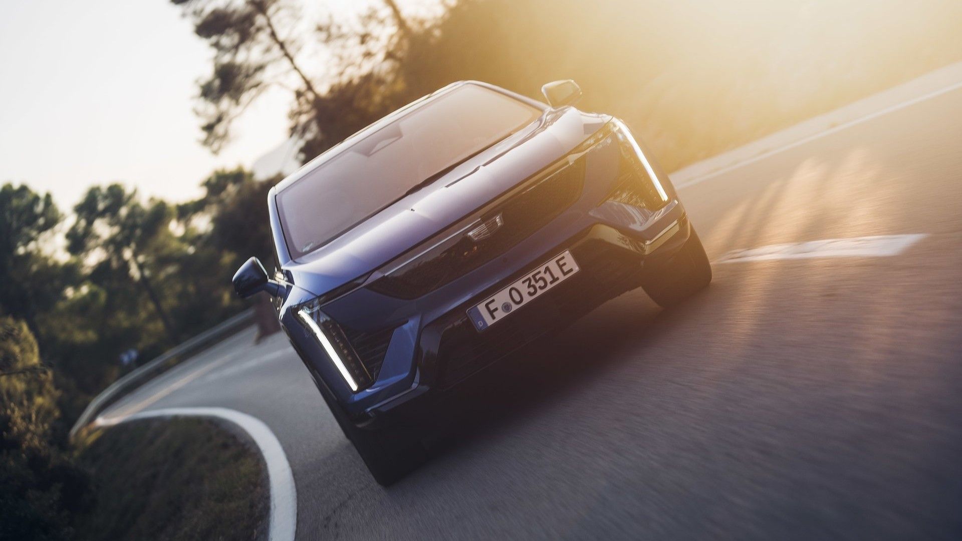 Front action shot of a 2025 Cadillac Optiq