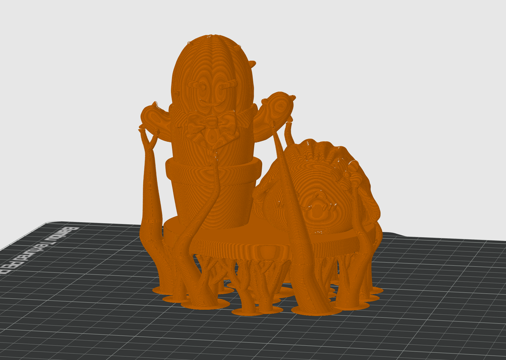 Bambu Studio showing the extensive support structure required for the cake topper's spike.
