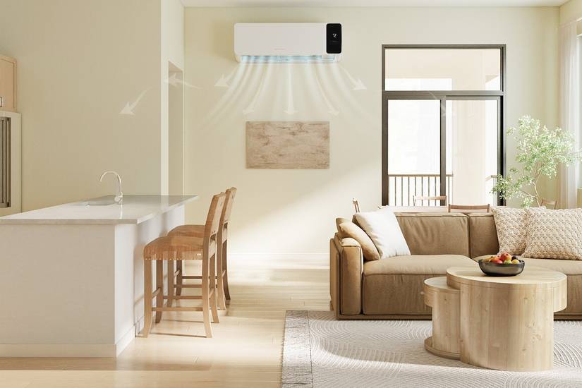 The COZEWARE Vizio mini split installed on a wall between a living room and dining room