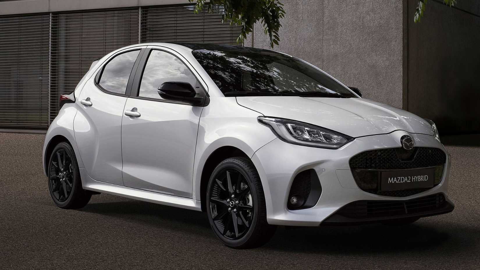 Static side profile shot of a 2024 Mazda 2 Hybrid.