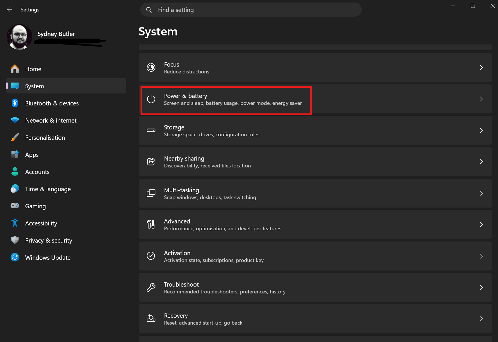 Windows 11 System settings page with the Power & battery option highlighted, showing where to access power management controls.