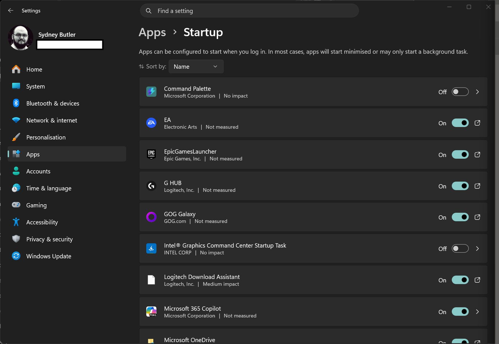 Windows 11 Settings app open to Apps > Startup, displaying a list of programs configured to launch automatically when the user signs in, with startup impact information and toggle switches to enable or disable each app.