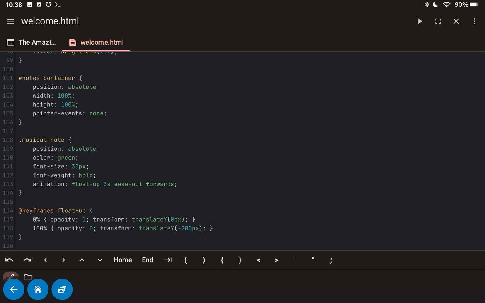 The CSS tags of an HTML file named welcome are being edited on a Fire tablet.