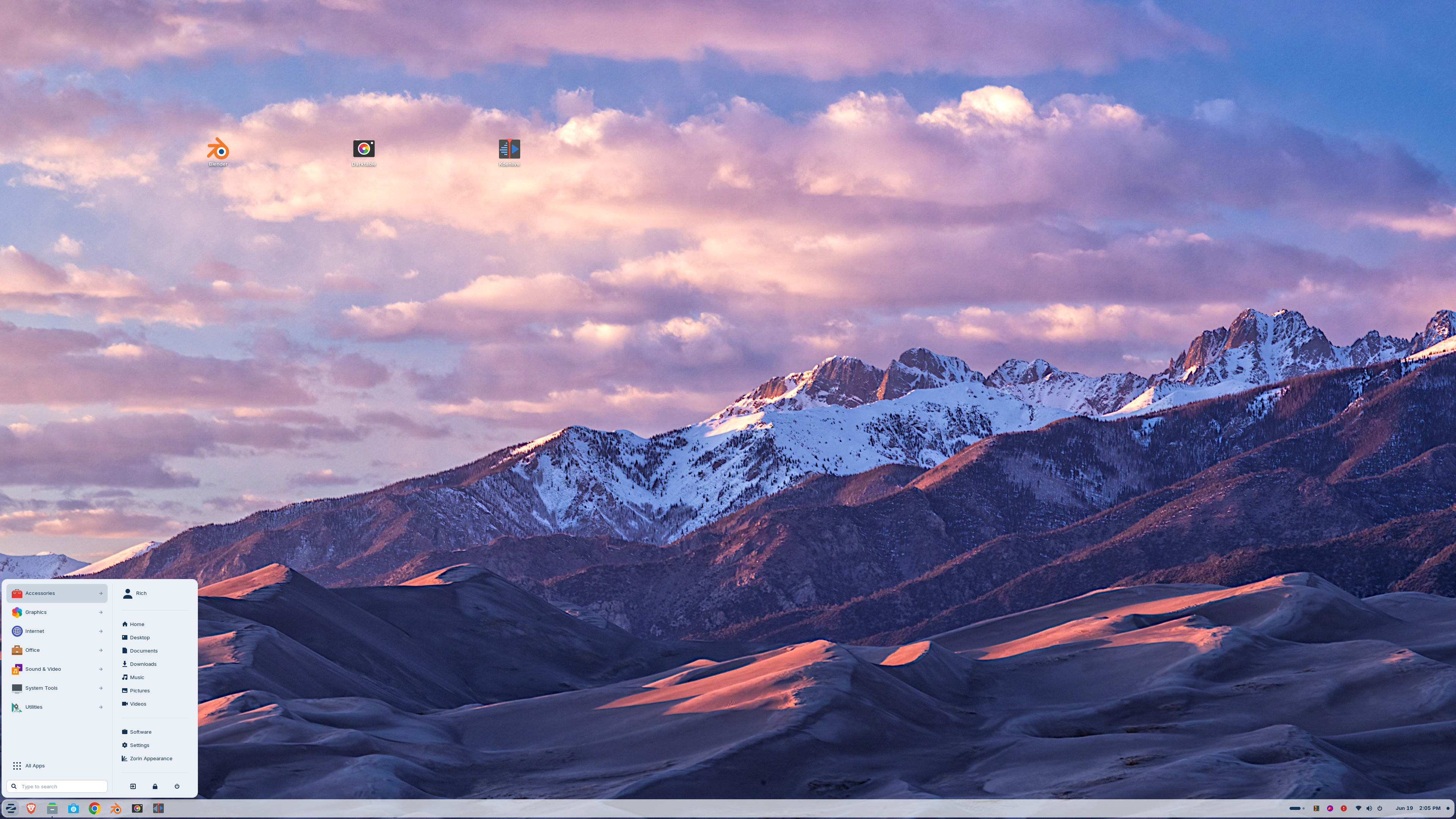 A screenshot of the Zorin OS home page with the Windows 7-like start menu open.