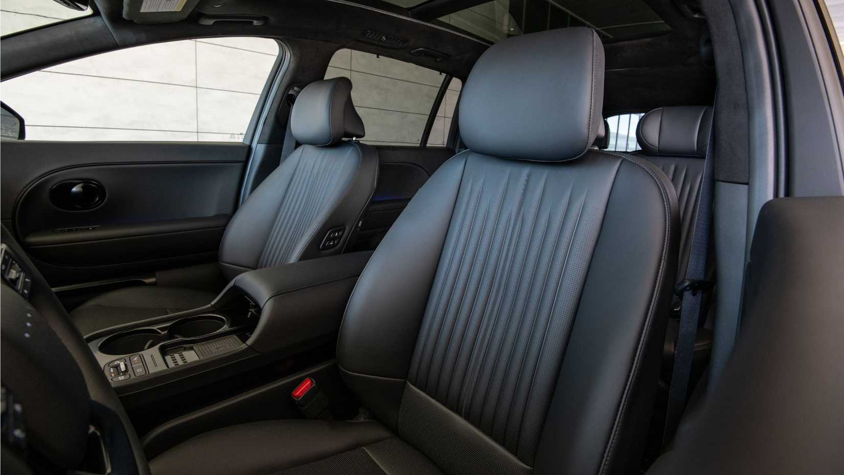 Shot of the front seats in a 2027 Hyundai Ioniq 9 Calligraphy Black Ink.