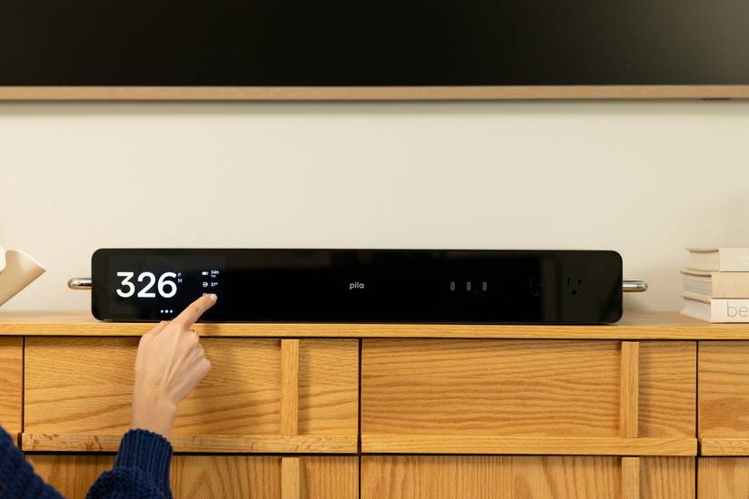 Pila mesh home battery on a TV stand. 