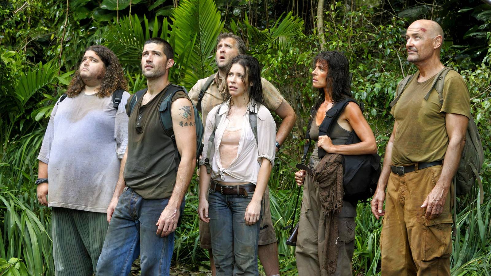 A group of people look up in Lost.