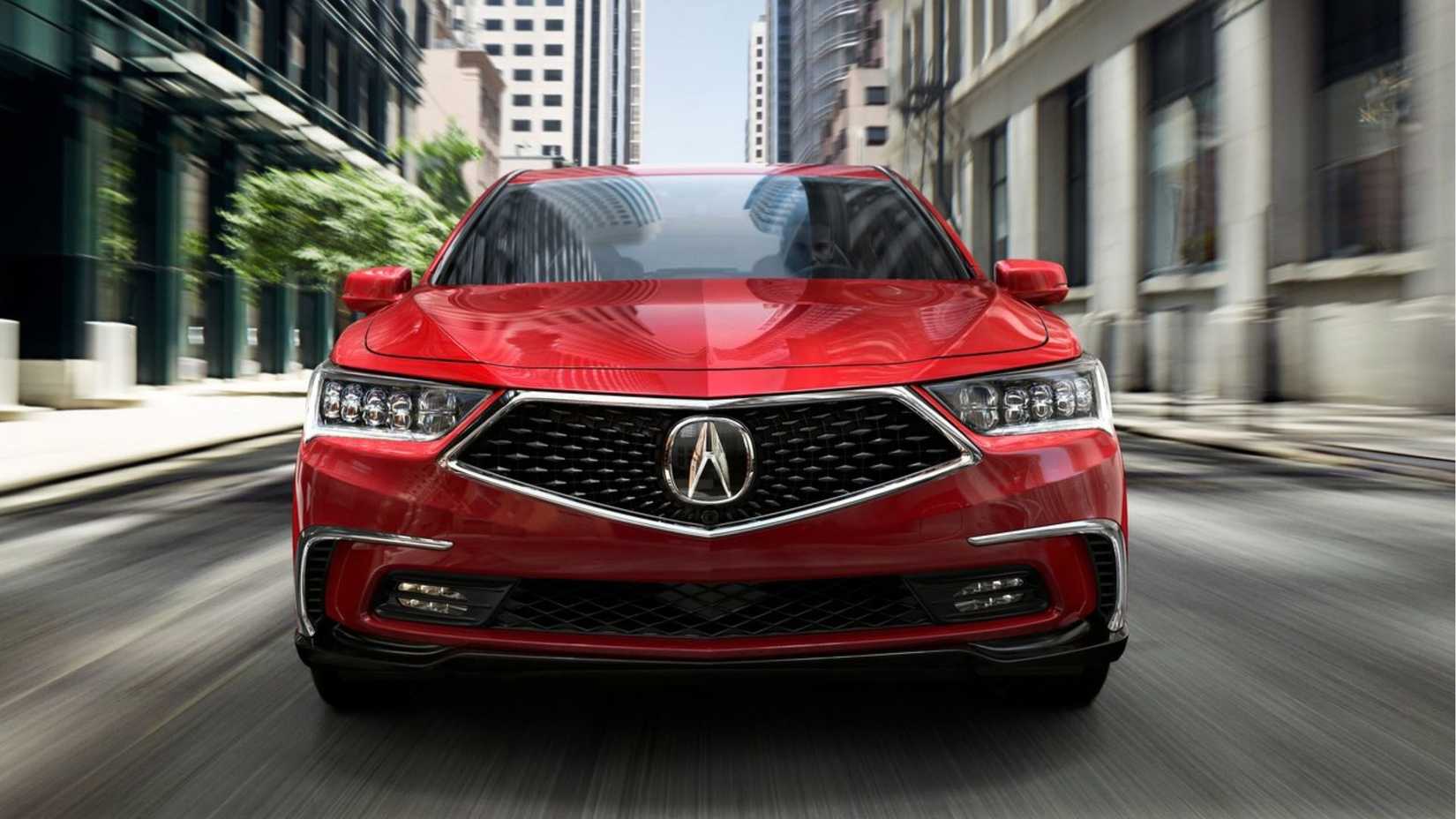 Dynamic front-end shot of a red 2018 Acura RLX.