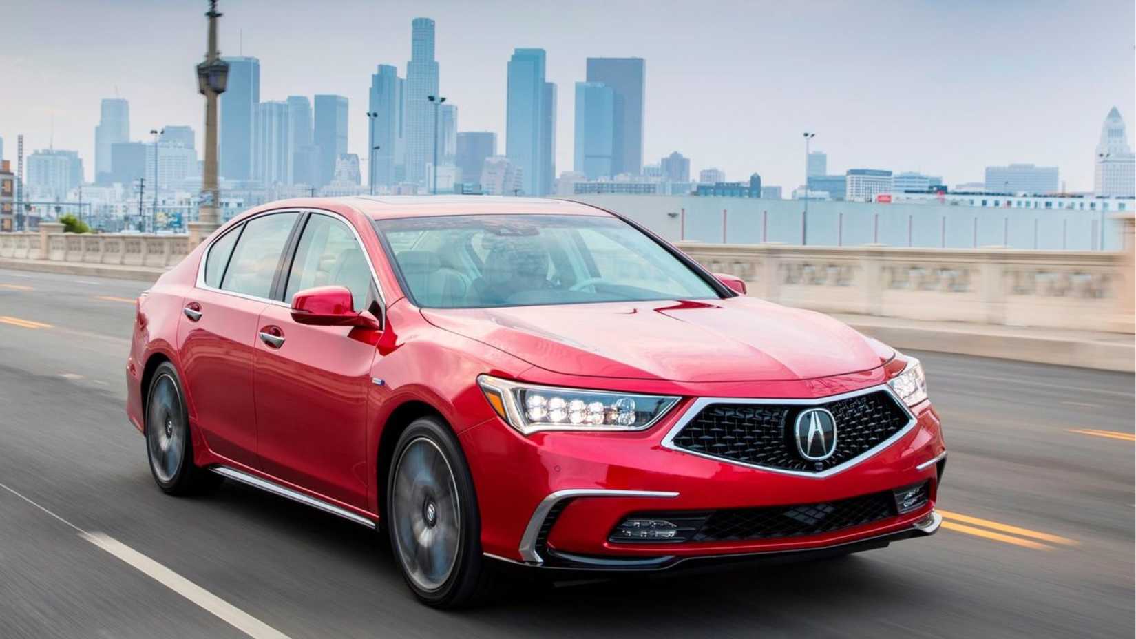 Dynamic front 3/4 shot of a red 2018 Acura RLX.