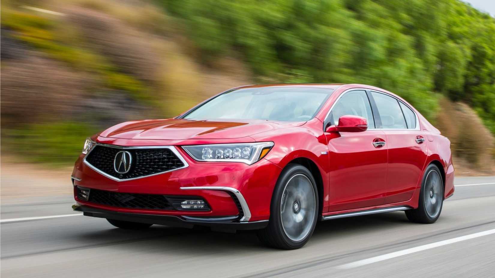 Dynamic front 3/4 shot of a red 2018 Acura RLX.