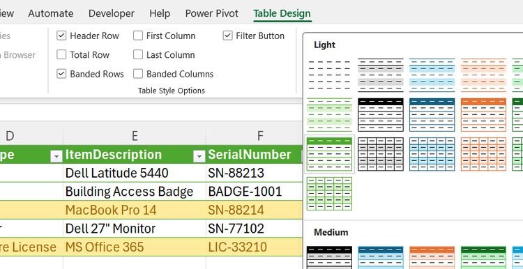 An Excel table is reformatted to Green Style Light 14.