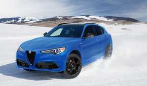 Front 3/4 action shot of a 2023 Alfa Romeo Stelvio