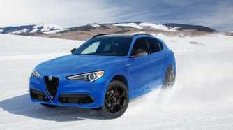 Front 3/4 action shot of a 2023 Alfa Romeo Stelvio