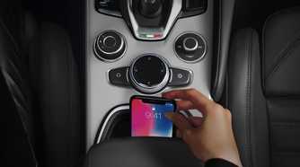 Close up of the phone storage compartment in a 2023 Alfa Romeo Stelvio