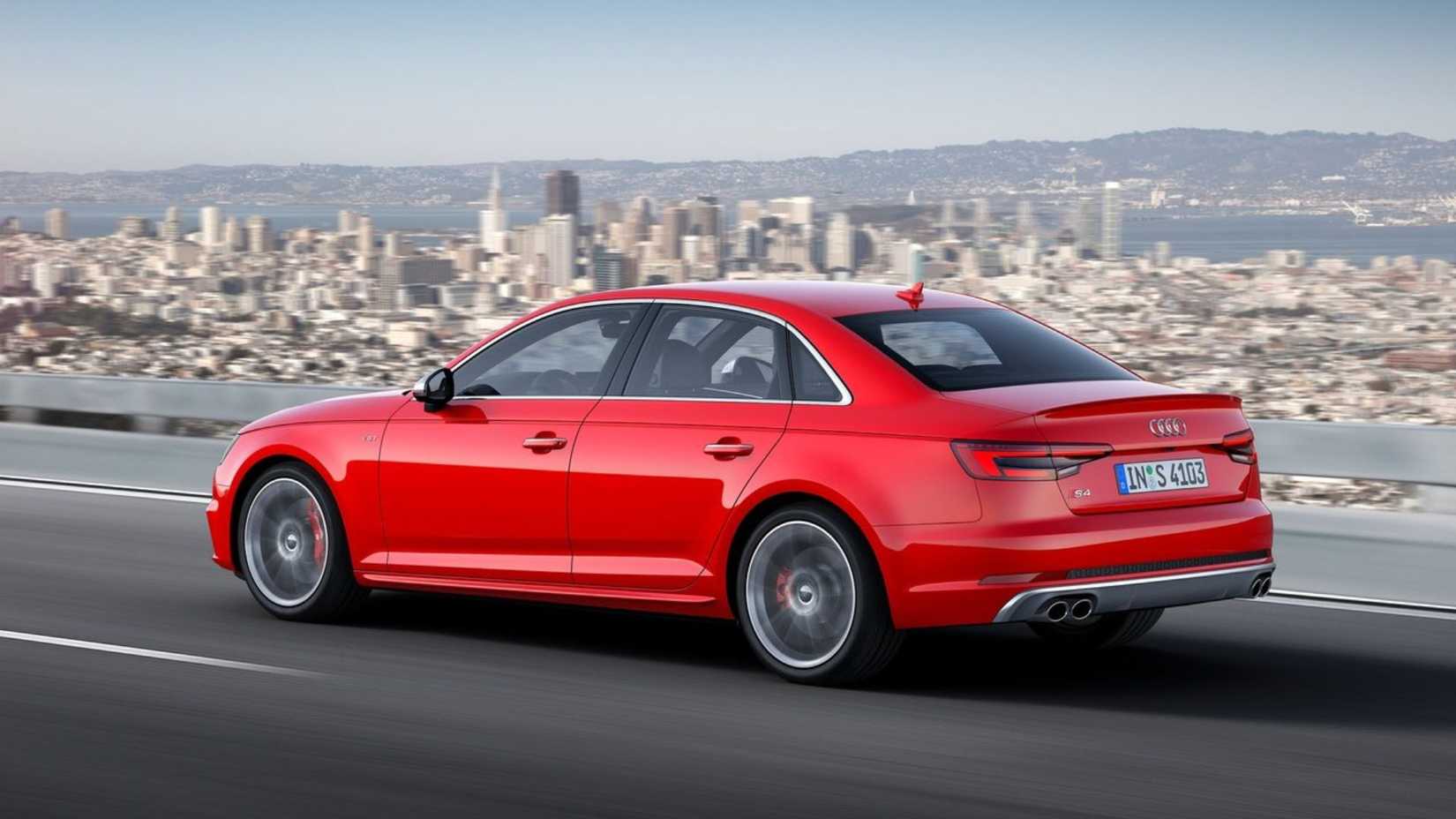 Dynamic rear 3/4 shot of a red 2017 Audi S4.