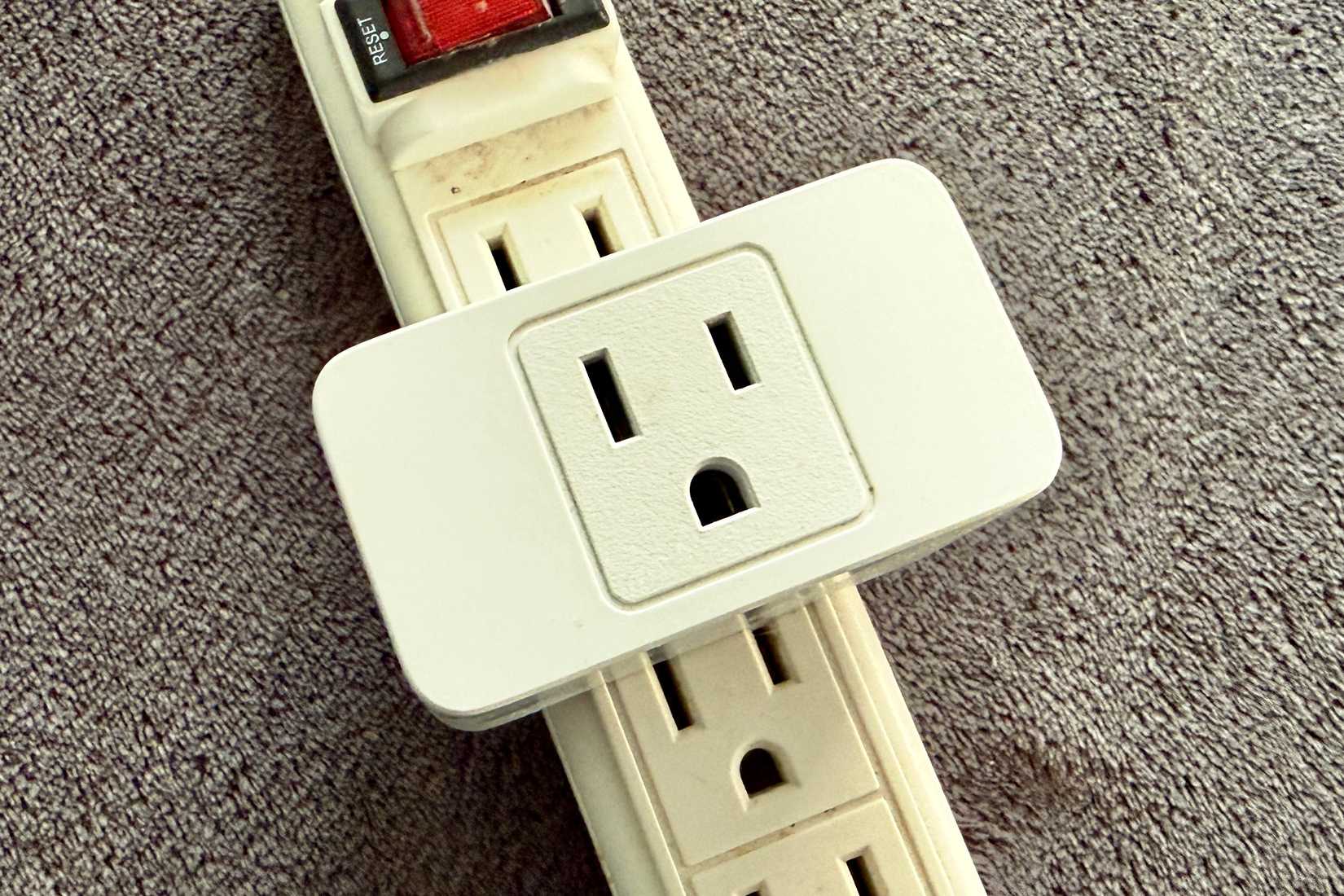 Smart plug taking up more than one outlet on an outlet strip.