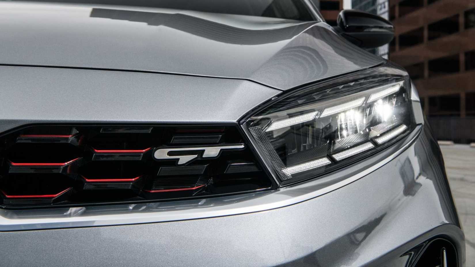Close-up shot of the headlight on a 2022 Kia Forte.