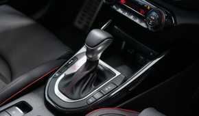 Close-up shot of the gear shifter in a 2022 Kia Forte.